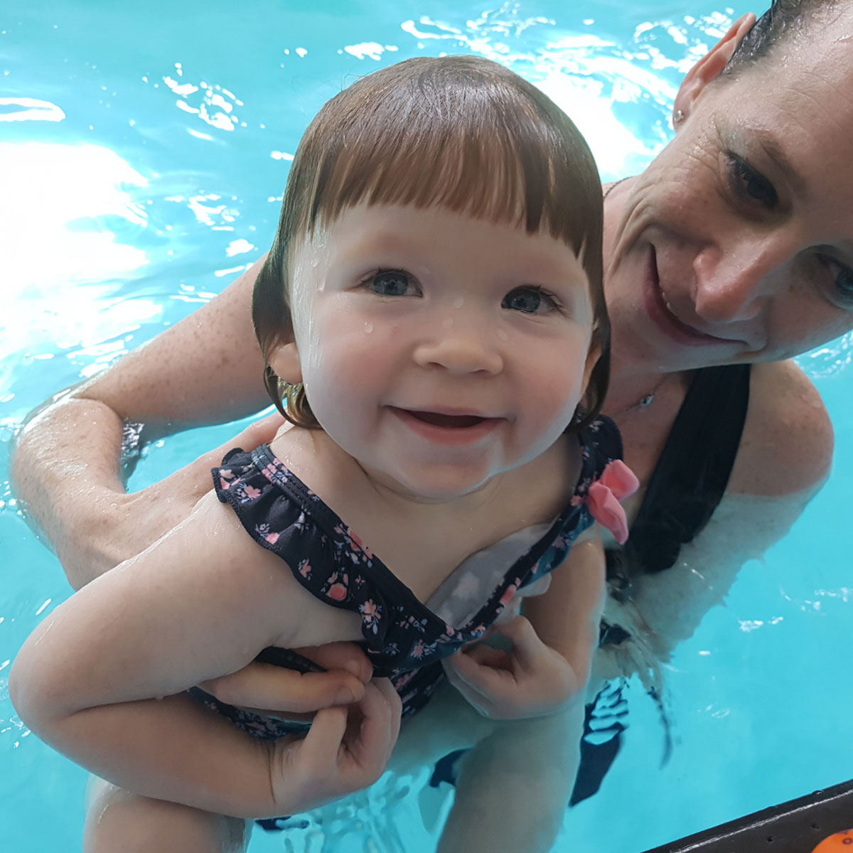 Little Splashes Aquatics - Infant Swimming Lesson Little Splashes Aquatics - Infant Swimming Lesson