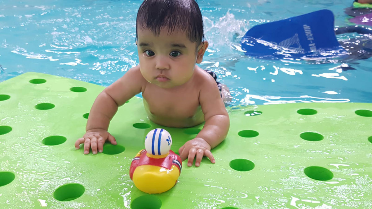 Little Splashes Aquatics - Infant Swimming Lesson Little Splashes Aquatics - Infant Swimming Lesson